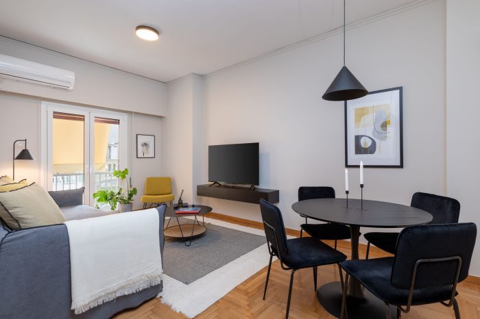 beehive apartments kipseli athens living room with dining area