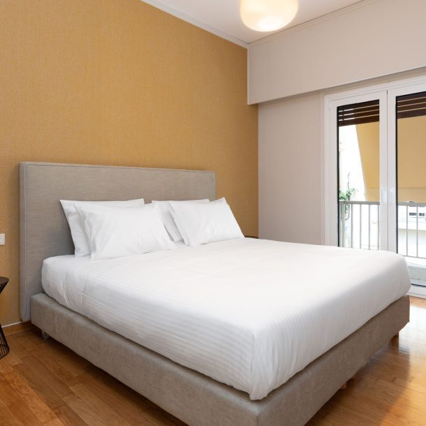 beehive apartments kipseli athens master bedroom with balcony