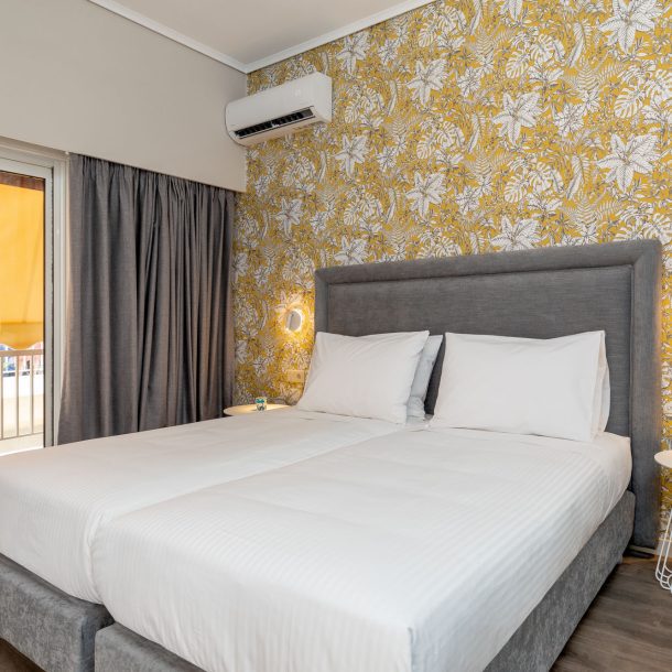 beehive apartments kipseli athens master bedroom with balcony view