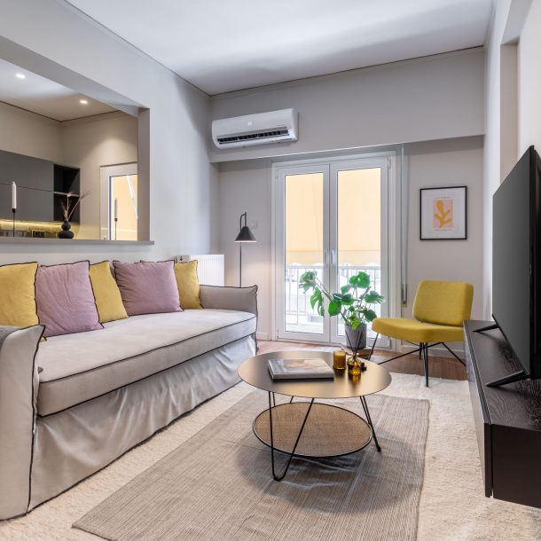 beehive apartments kipseli athens living room with balcony view