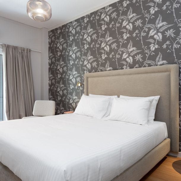 beehive apartments kipseli athens double bedroom with balcony view