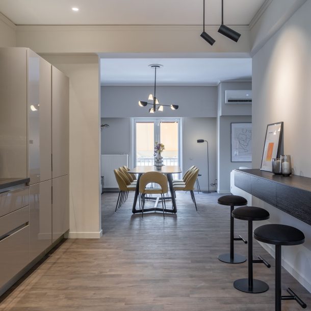 beehive apartments kipseli athens sitting area with dining area view