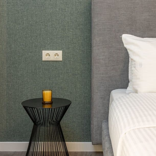 beehive apartments kipseli athens double bedroom with side table