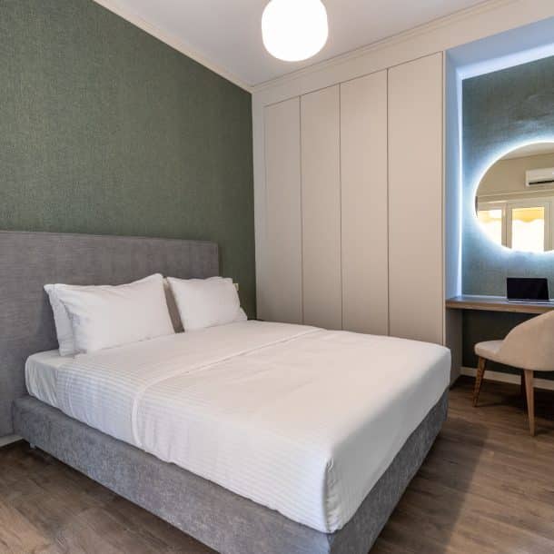 beehive apartments kipseli athens double bedroom with desk area